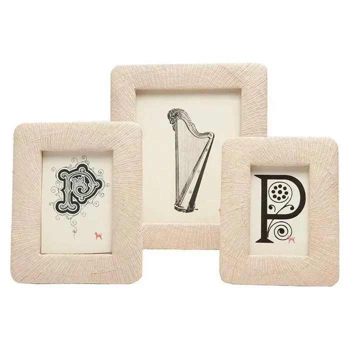 White track lighting for a clean lookAncona Picture Frames