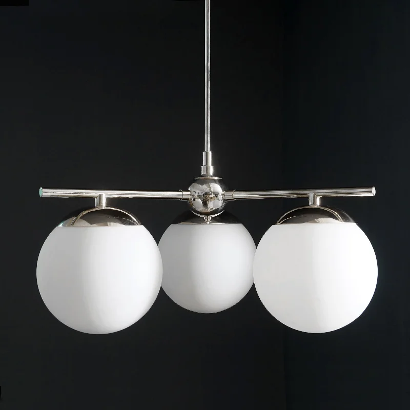 Oversized Chandeliers as a Statement Piece in Living RoomsOversized Chandeliers as a Statement Piece in Living RoomsModern Brass 3 Glass Sphere Globe Chandelier 34"D