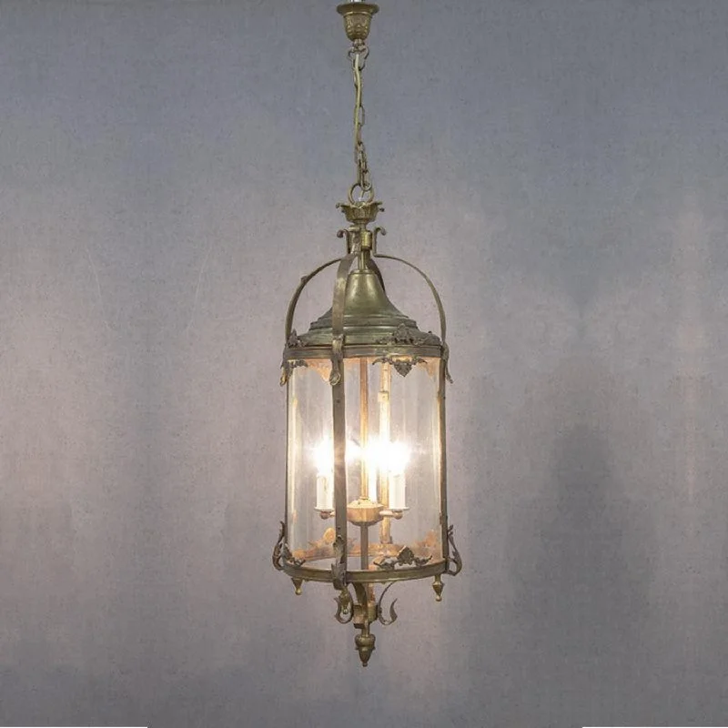 Chandeliers with Colored Glass for a Splash of ColorChandeliers with Colored Glass for a Splash of ColorRubens Chandelier in Antique Brass Chandeliers with Colored Glass for a Splash of ColorChandeliers with Colored Glass for a Splash of ColorRubens Chandelier in Antique Brass